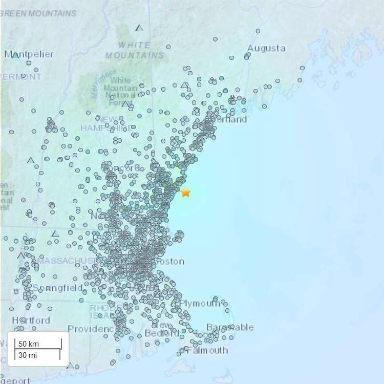 A map of the New England coast. A yellow star shows off the coast of Maine and many little dots show where people reported feeling the quake. The dots extend from north of Portland to south of Providence, RI and west of Springfield, MA.