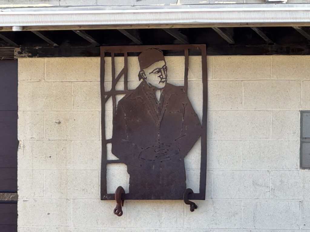 A rusted steel carving of a man. It's more beautiful than it sounds.