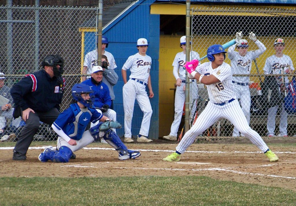 A Revs player gets ready to swing his bat.